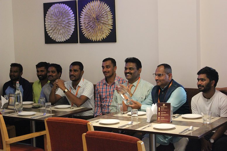 Guests raising a toast at Marigold restaurant