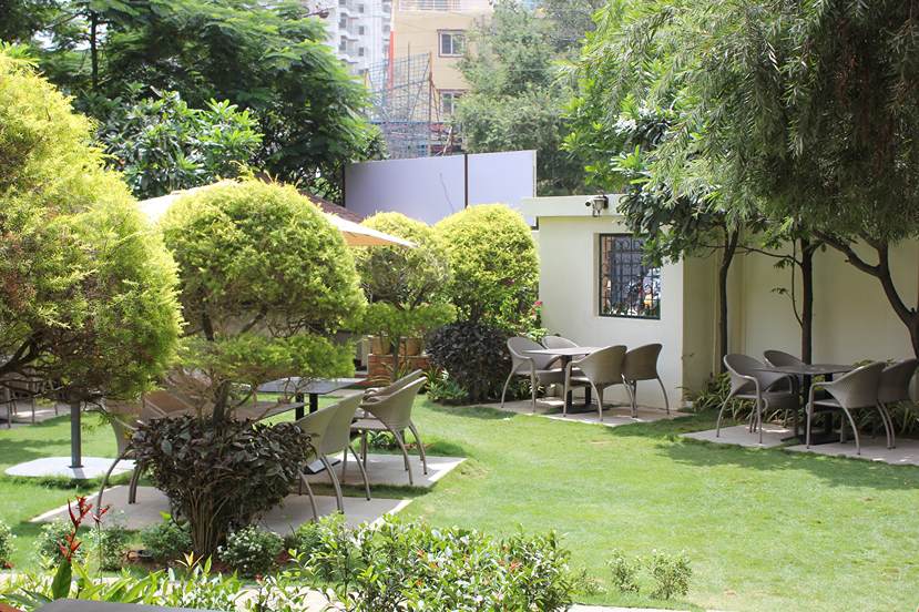 Garden landscape at Marigold restaurant Whitefield